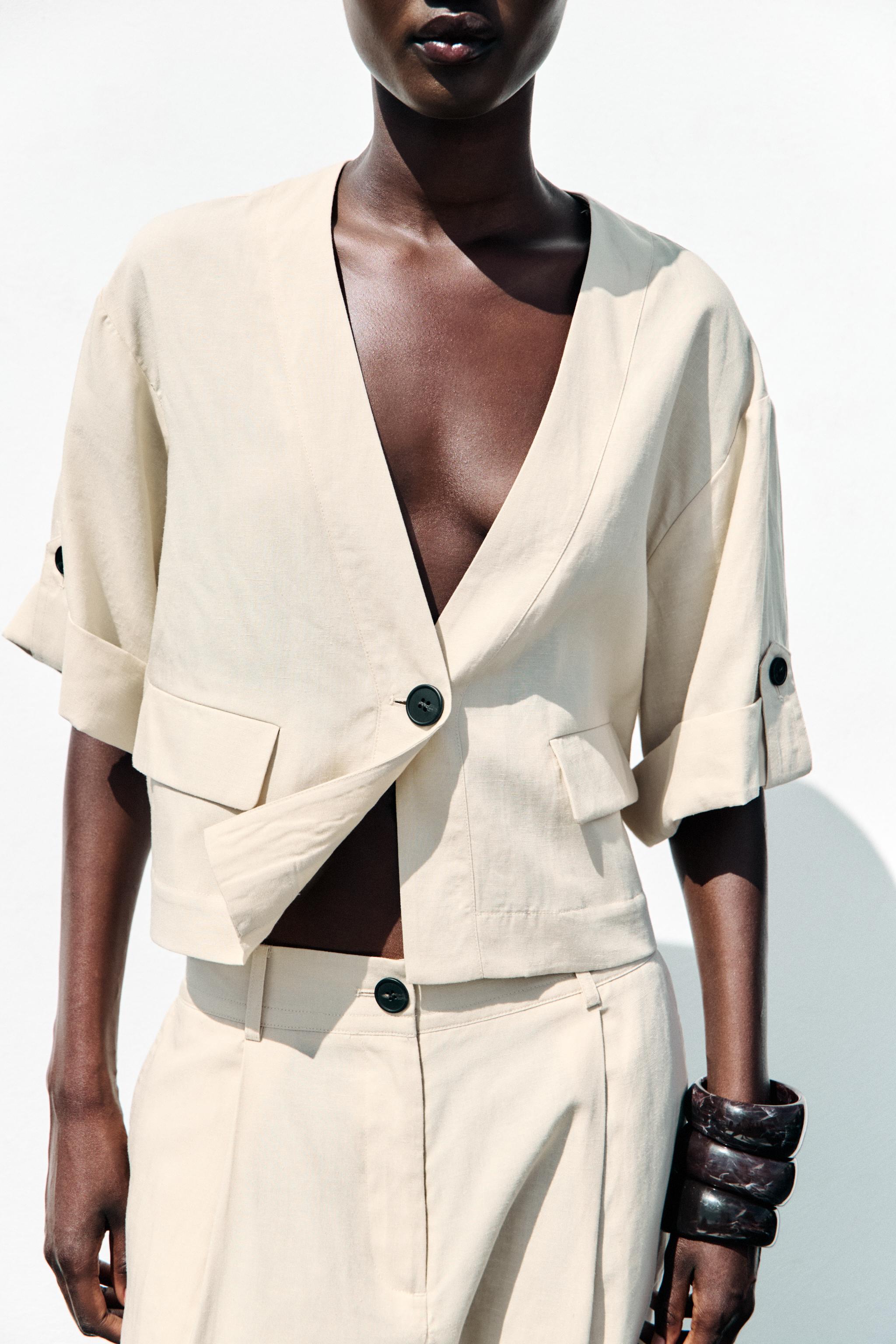 PANTALON À PINCES ET TAILLE ÉLASTIQUE